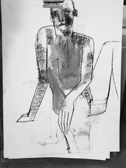 Drawing portrait of a naked male art model