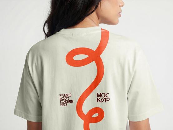 The back of a T-shirt is often overlooked in apparel design, even though it offers a large canvas for bold graphics, vertical typography, and oversized illustrations that can tell a stronger visual story. Presenting these designs effectively requires a high-quality mockup. This T-shirt back-view Photoshop mockup by Adobe Stock contributor 72 addresses that need with a clean, high-resolution, model-worn template that highlights the back panel as the main visual focus.