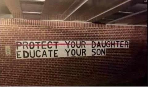 Malerei an Wand
Durchgestrichen: protect your daughter
Darunter steht: educate your son