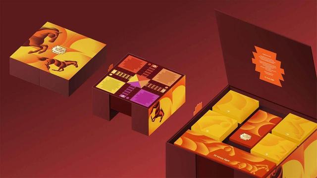 A colorful board game box with a horse design opens to reveal game cards and a vibrant game board featuring various sections.