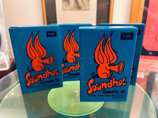 4 Soundhog hard shell blank tapes. They are blue with a red creature front and centre which I think is supposed to be a pig, with huge ears and a trumpet nose. The EMI logo is in black top right.
