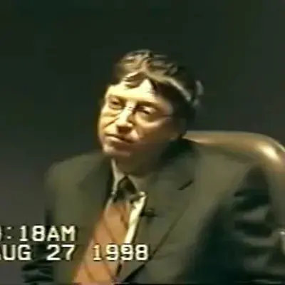 Capture of Bill Gates looking annoyed while testifying during the famous MS antitrust case.