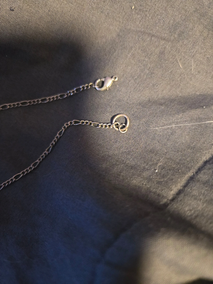 The clasp fell off its ring