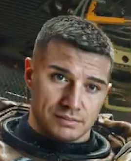 A screenshot from Nvidia's DLSS5 announcement, showing a character from Starfield with "DLSS ON". The face appears to be replaced by a diffusion-generated one, with differently shaped and coloured eyes (the right eye, viewer left, is substantially larger than the other), and apparently incorrect perspective. Next to the "DLSS OFF" shot, it looks as though the face has been lasso selected in Photoshop and rotated/moved. The chin appears broader than the original.