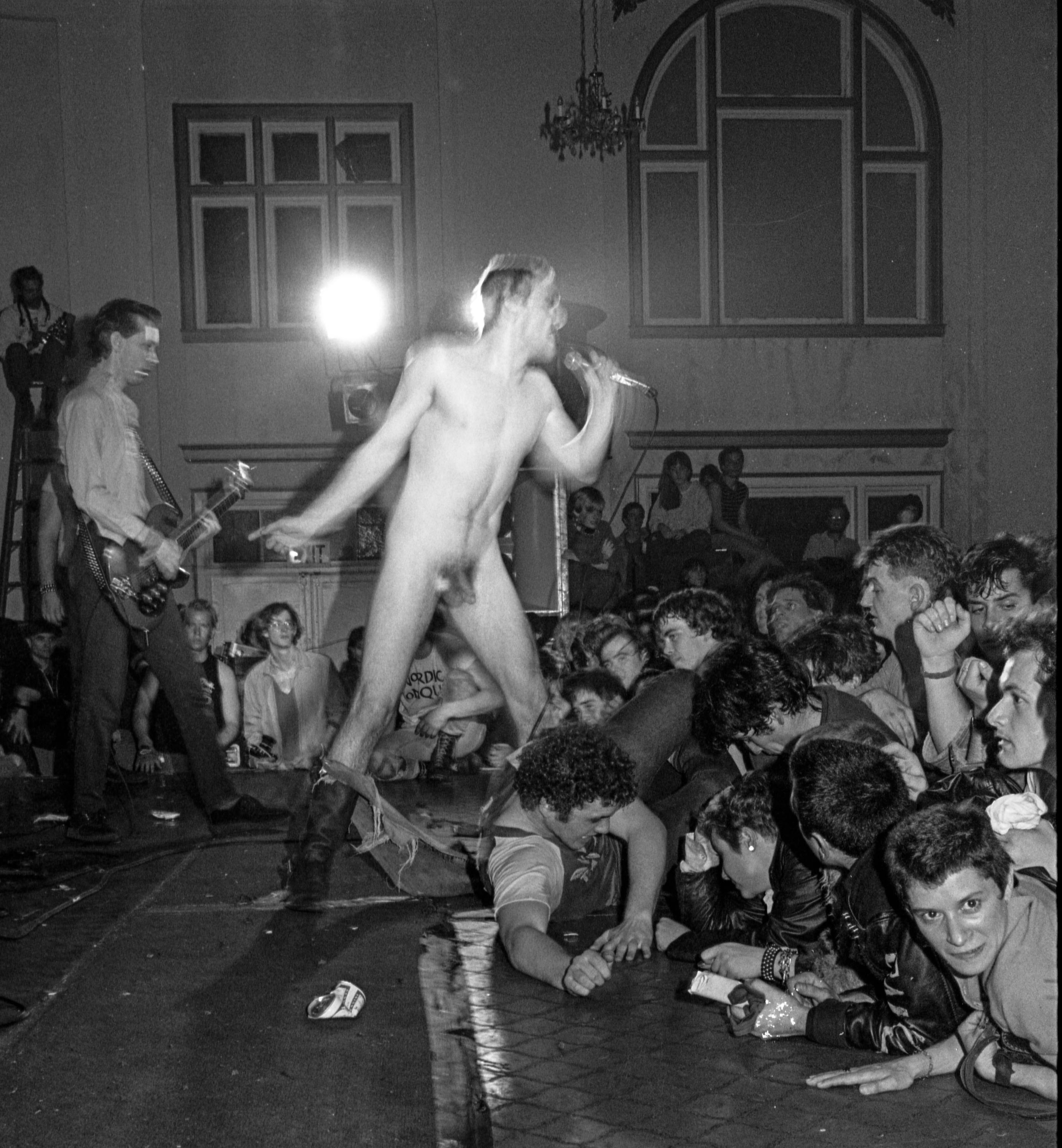 Dead Kennedys Mar 20, 1982 a view from the side of the stage Jello Biafra performing, the crowd had torn off his clothes a cruch of people against the stage, David Gallagher (that's me) crawling from the crowd