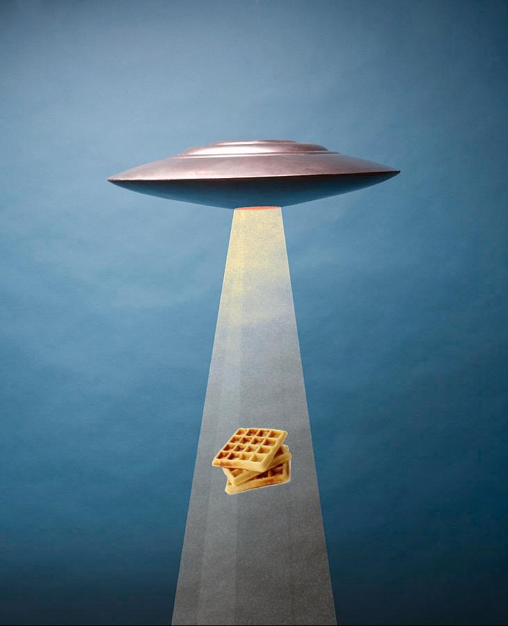 Stack of waffles being teleported by a flying saucer