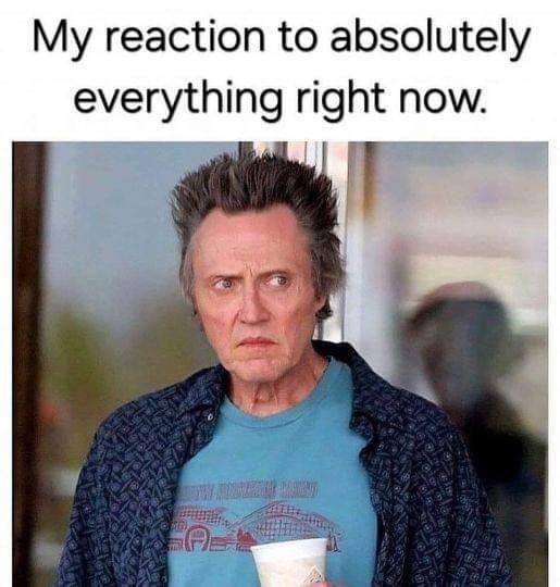 Meme of Christopher Walken coming out of a coffee shop looking hostile.