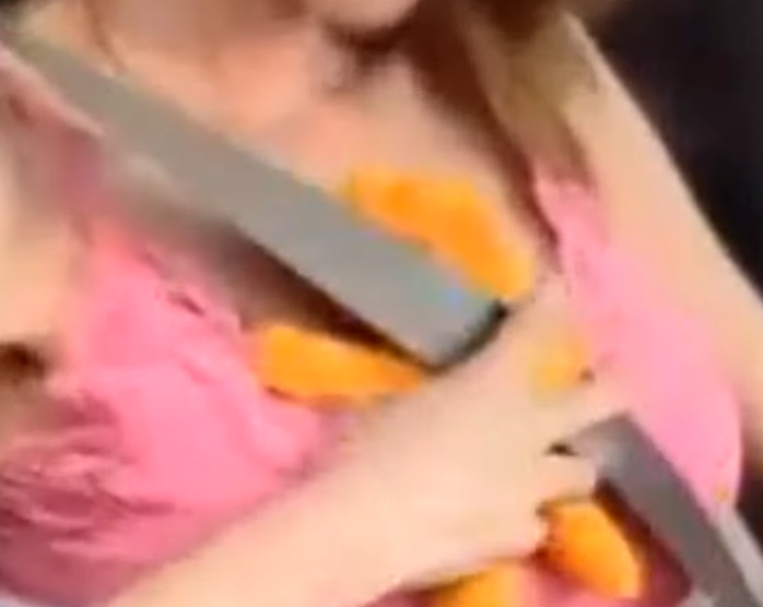tiddy bear is actually connected to a seatbelt strap and a woman moves him along the length to be above her er... tiddies. it turns out his purposes is to avoid seatbelt pain on your tits