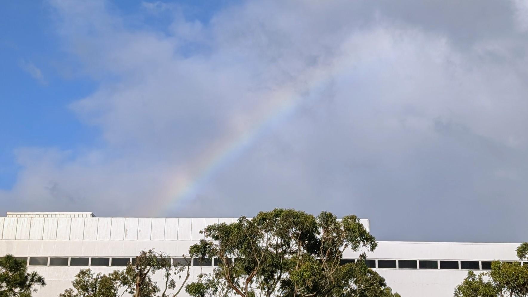 A rainbow over San Francisco Airport as clouds and rain are blown away by clearer skies.