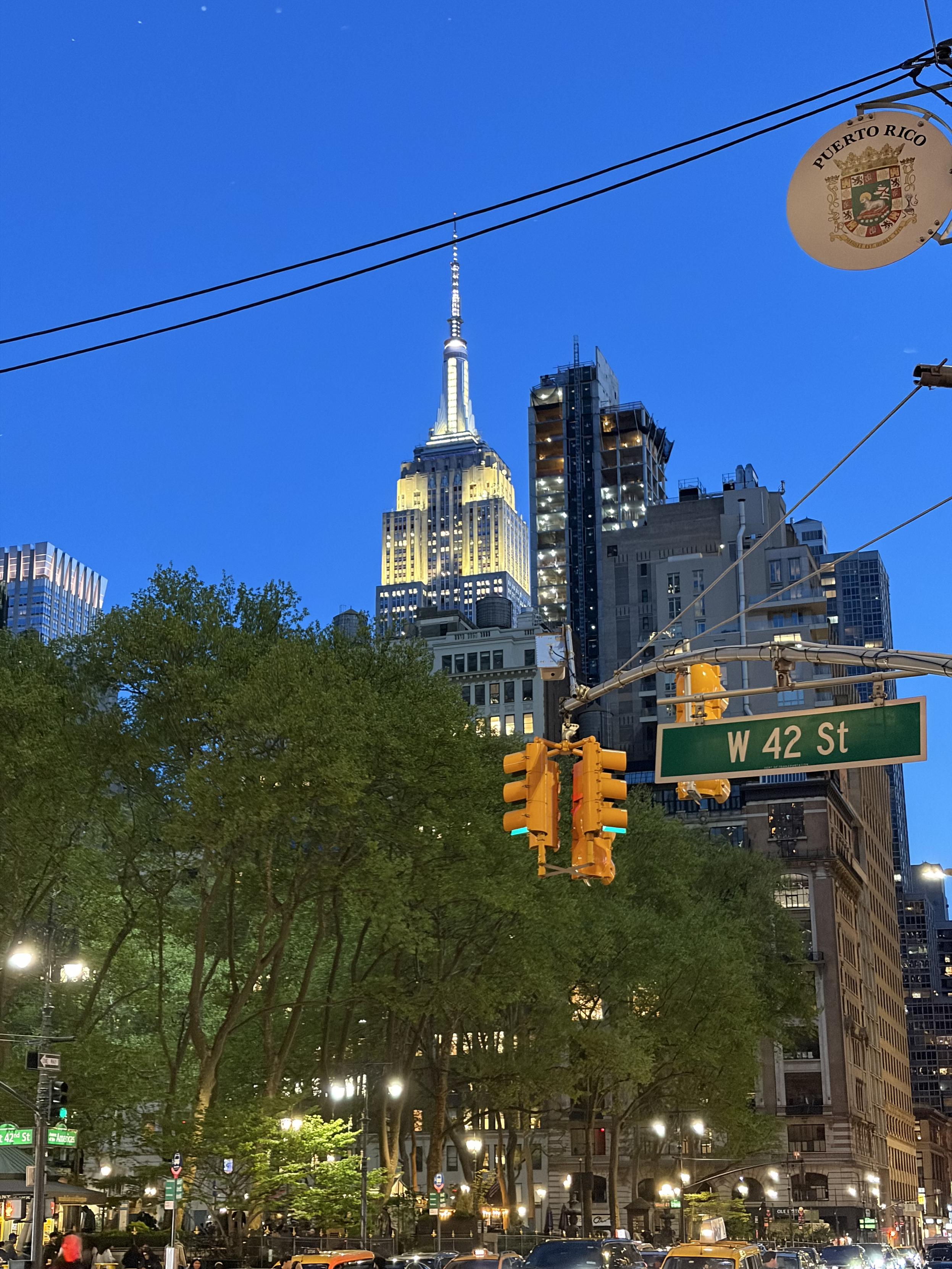 Evening photo of the Empire State Building from very far away.