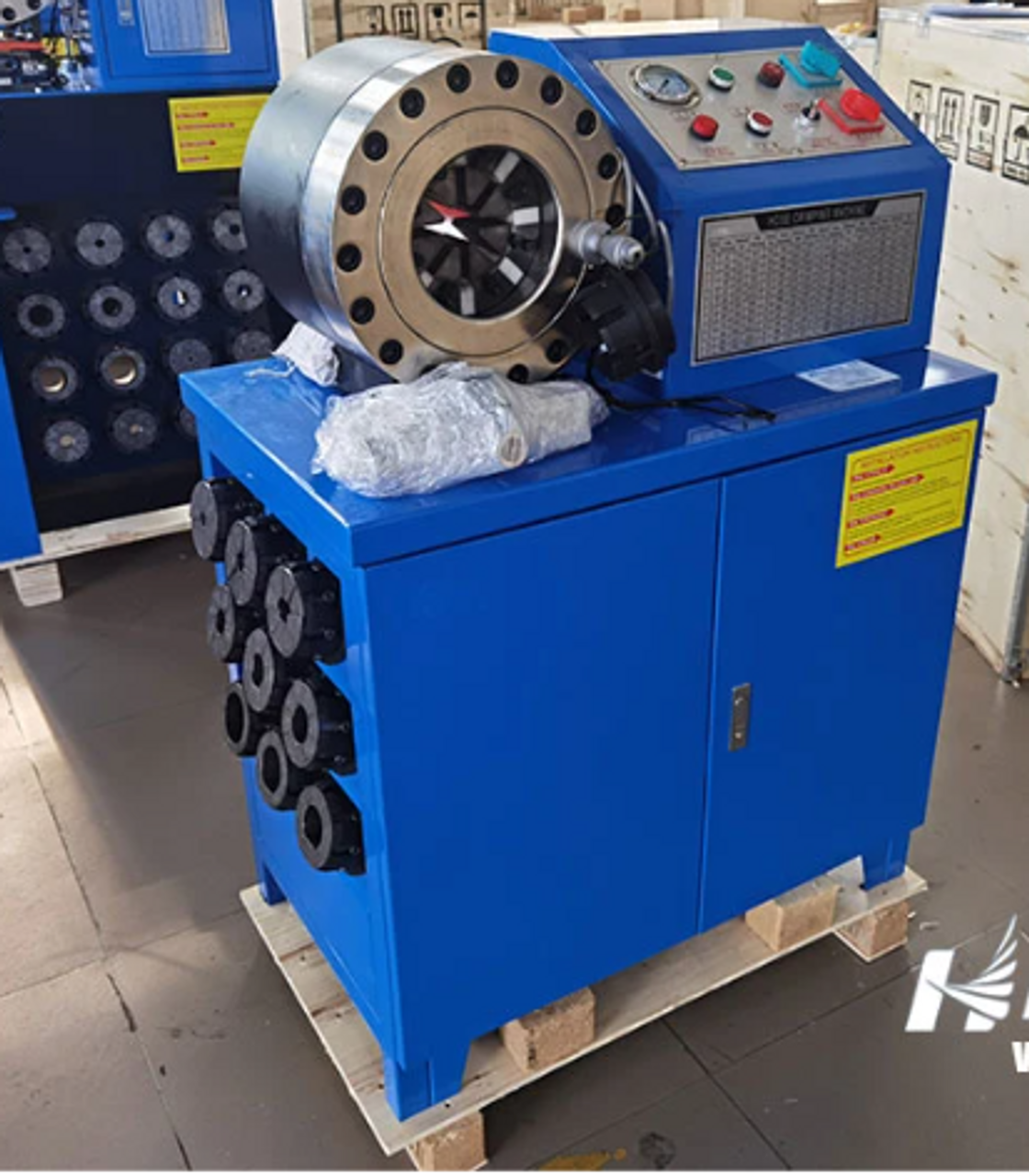 it's a large freestanding machine. the interesting bit is a cylinder inside of which sit 8 rounded off triangle-shaped bars arranged evenly around the cylinder interior with gaps in between.