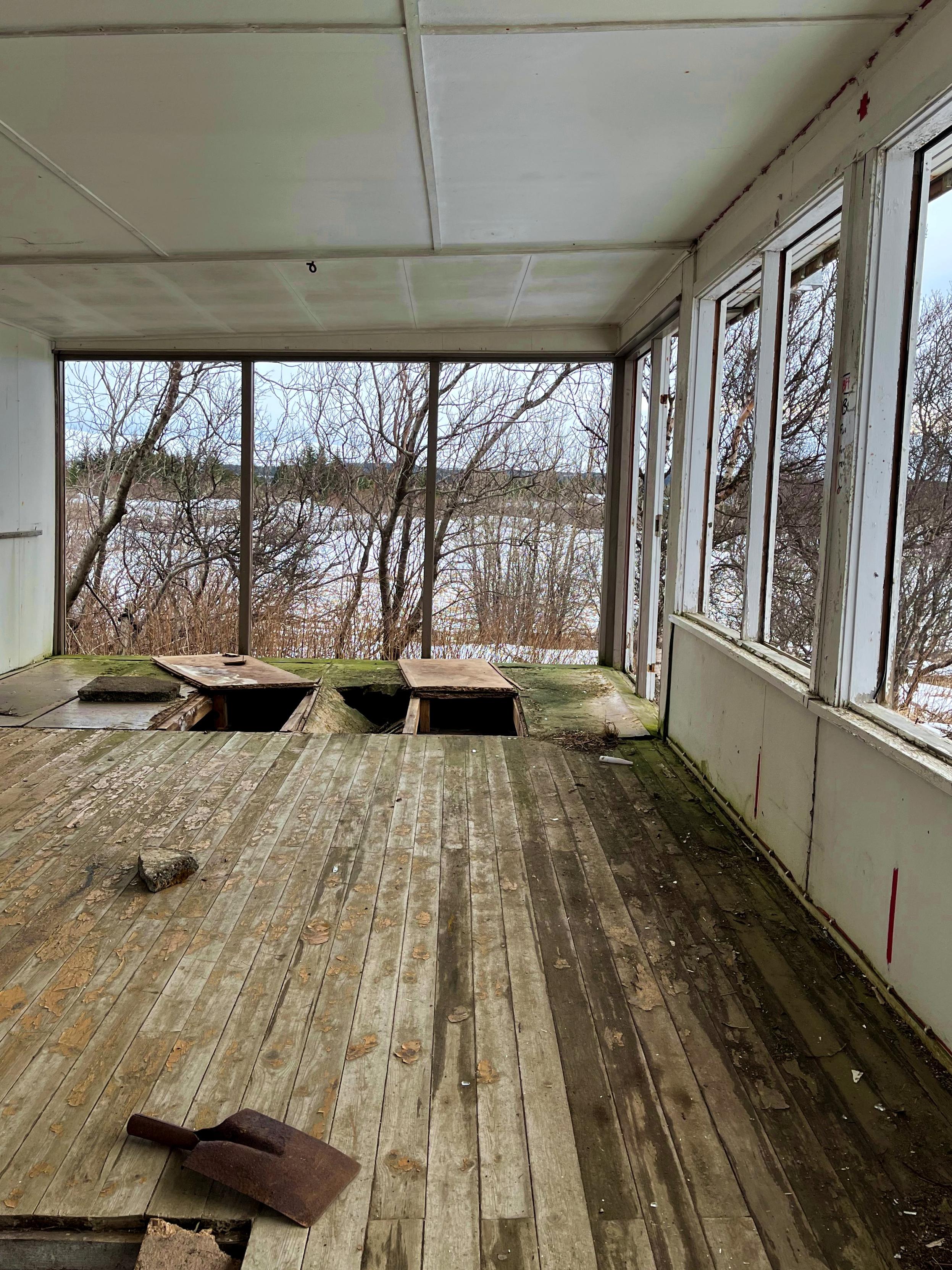 The inside of an abandoned summer cabin.