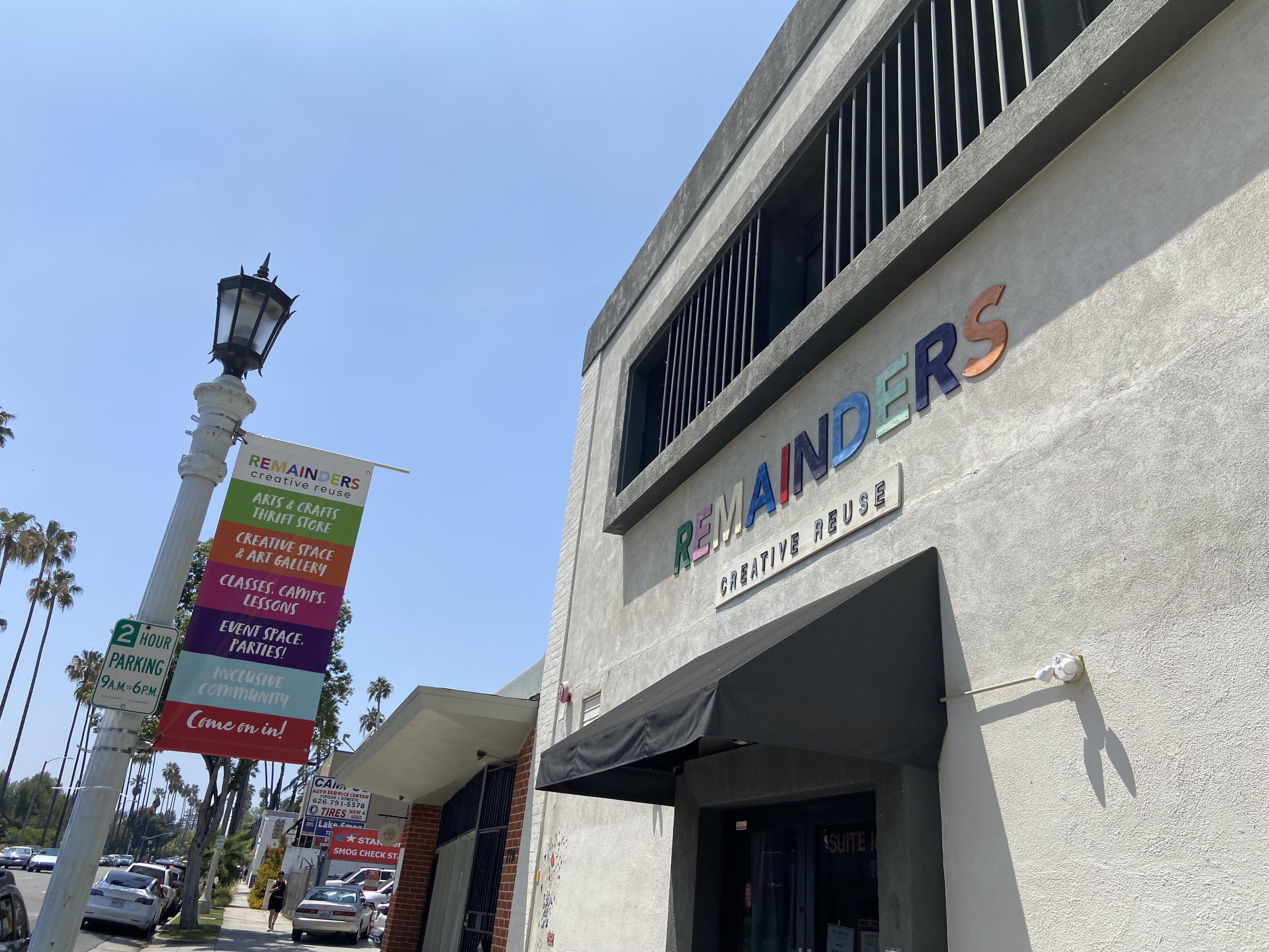 The colorful sign outside Remainders.