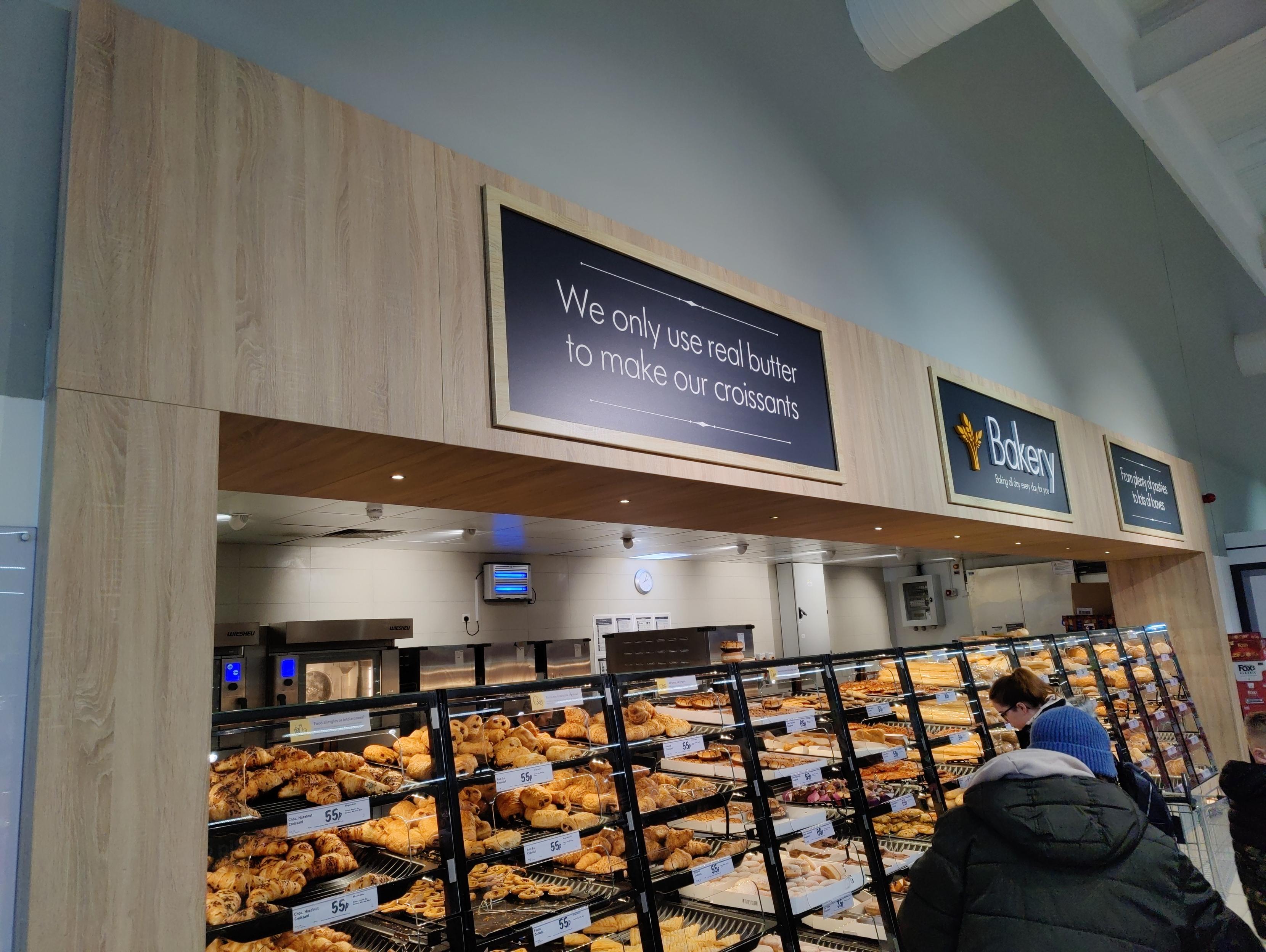 A sign saying 'We only use real butter to make our croissants', which Peter would tell you should read 'We use only real butter to make our croissants', raising the question of how it holds together without flour.
