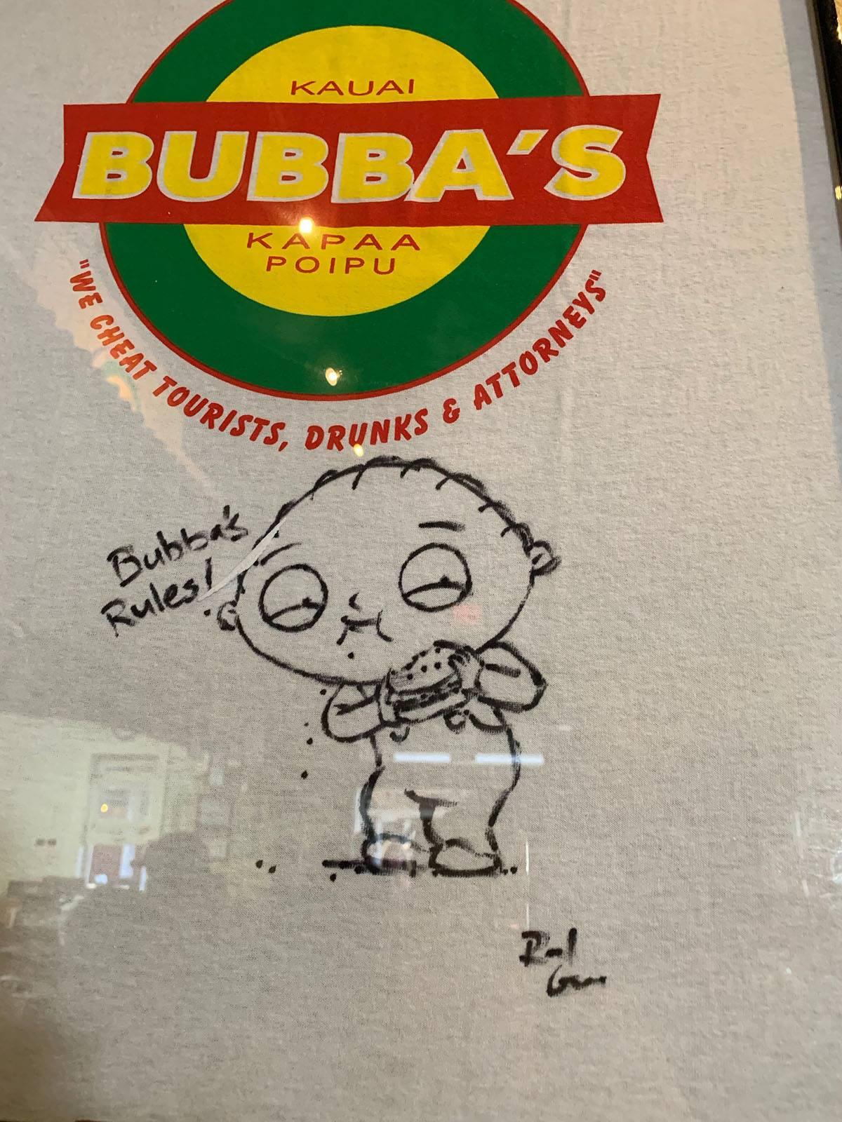 A signed t-shirt with Sharpie art of Stewie from Family Guy eating a burger and saying "Bubba's rules"