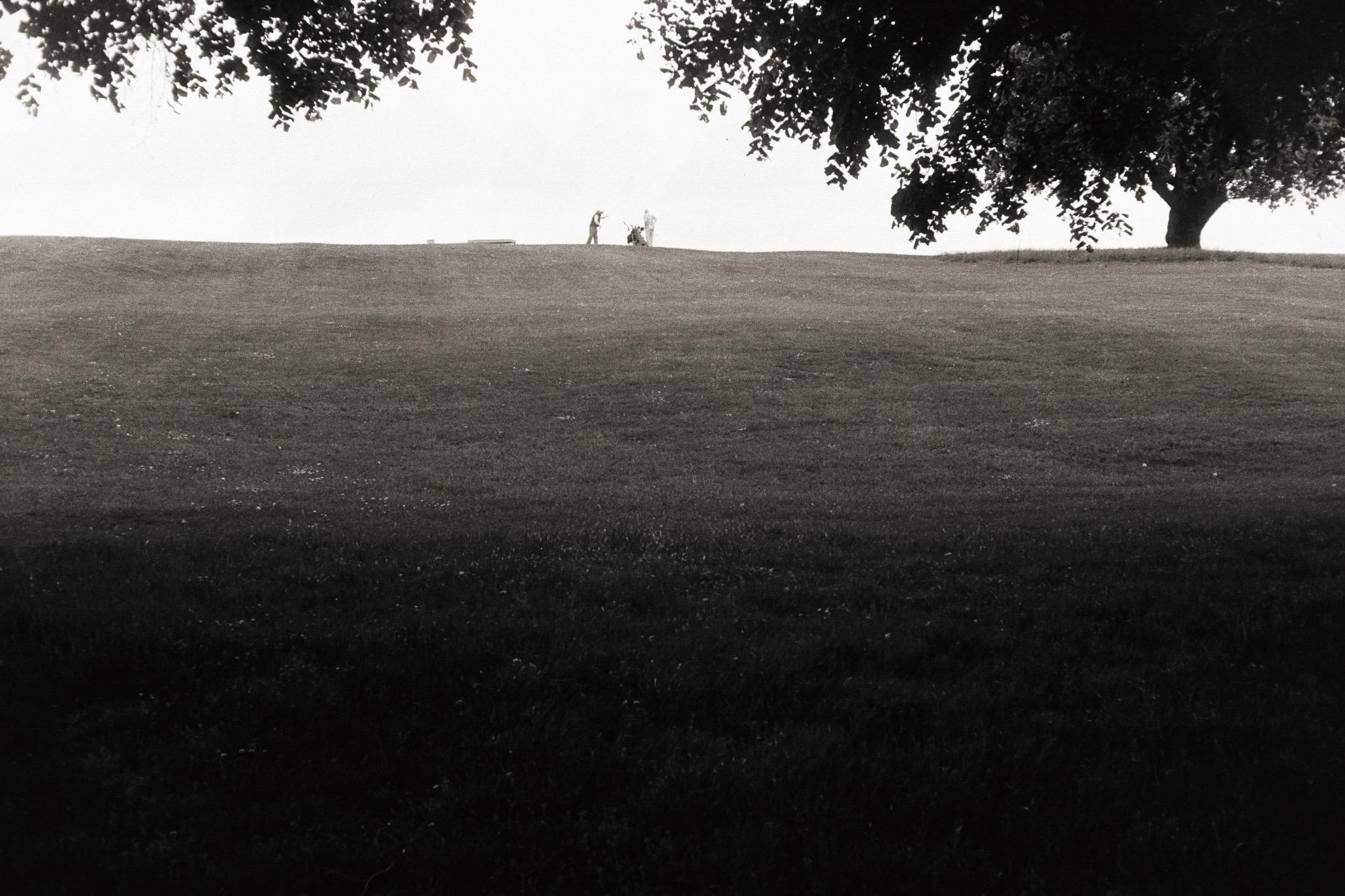 A pair of golfers seem to argue in the Ashton Court golf course in Bristol.