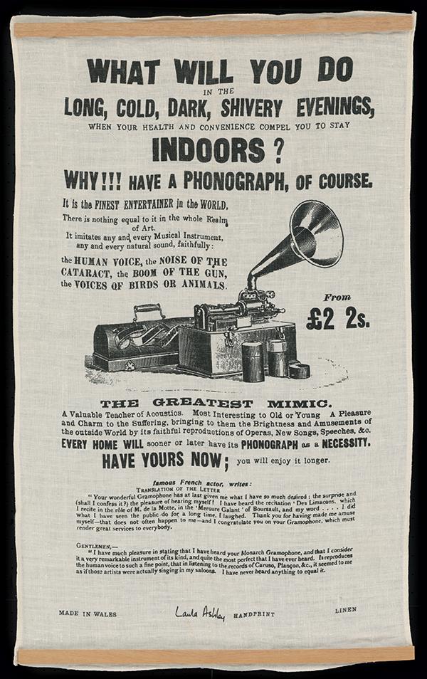 Printed linen tea towel advertising phonographs with the headline quoted.