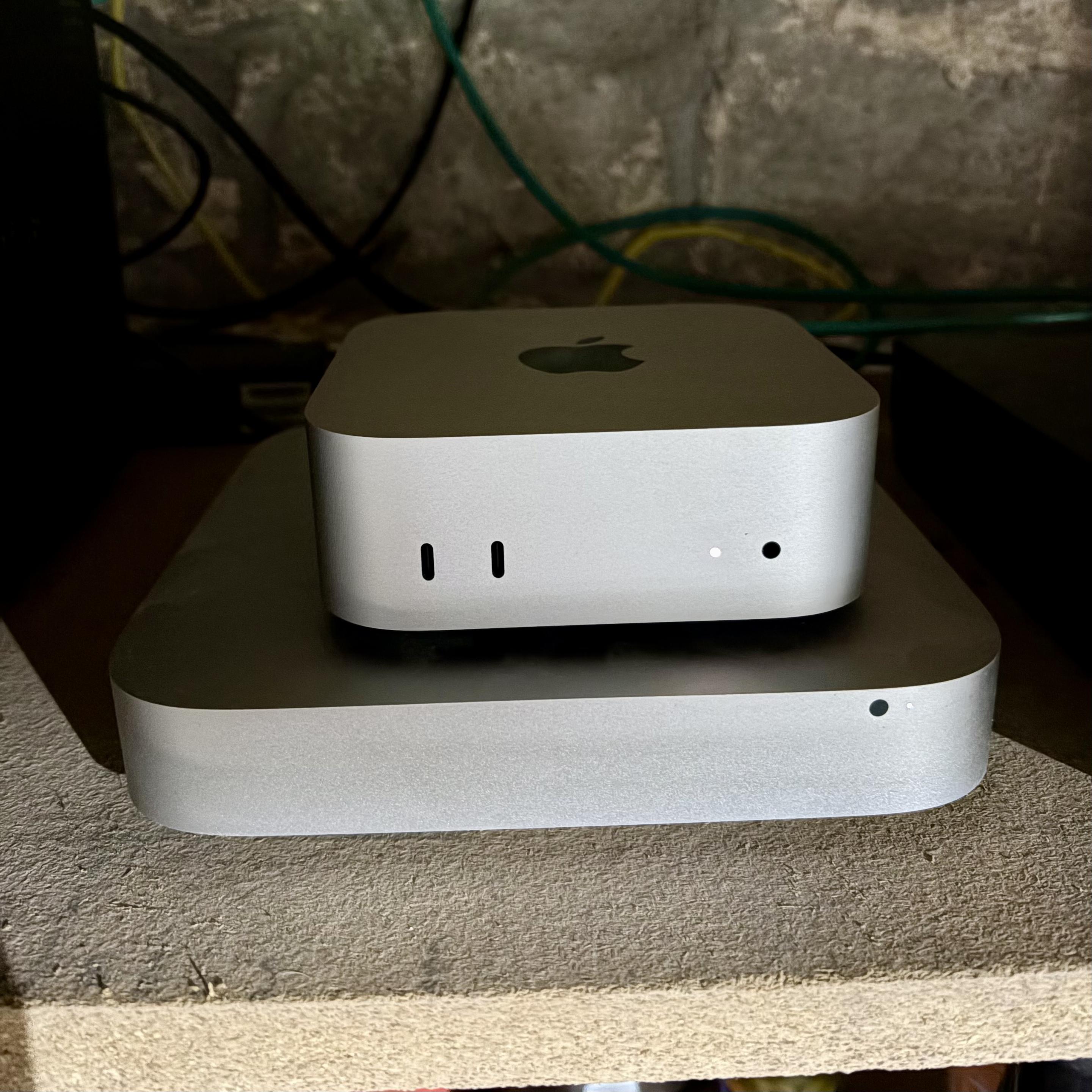 2025 m4 Mac mini sitting on top of a 2012 Mac mini.