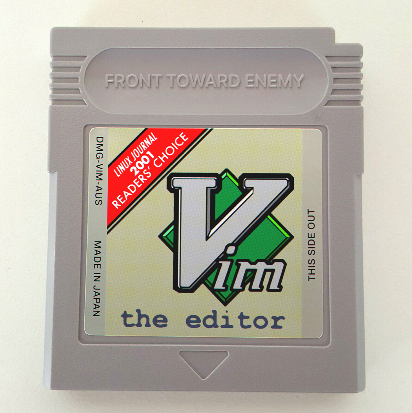 A picture of a game boy cartridge for VIM the Editor, Linux journal 2001 Readers' Choice editor. Embossed in the top grip section is the text "FRONT TOWARD ENEMY"