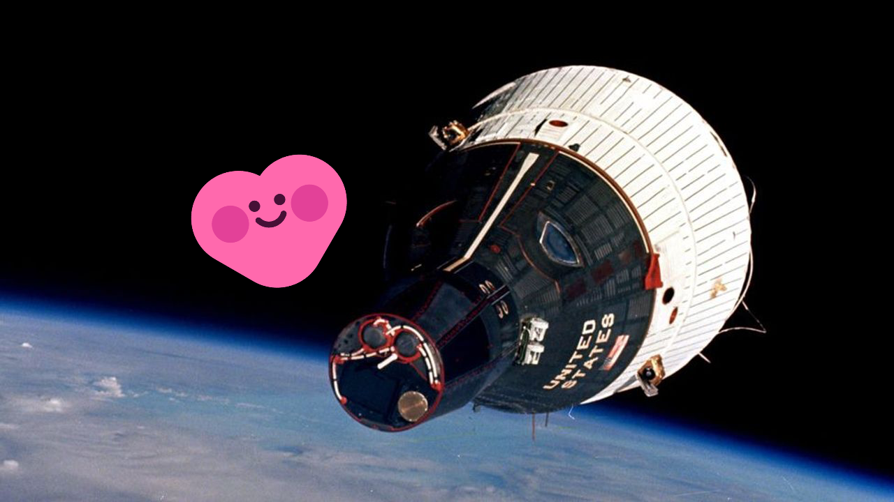 A photograph of the NASA Gemini capsule in orbit, with Prami nearby.