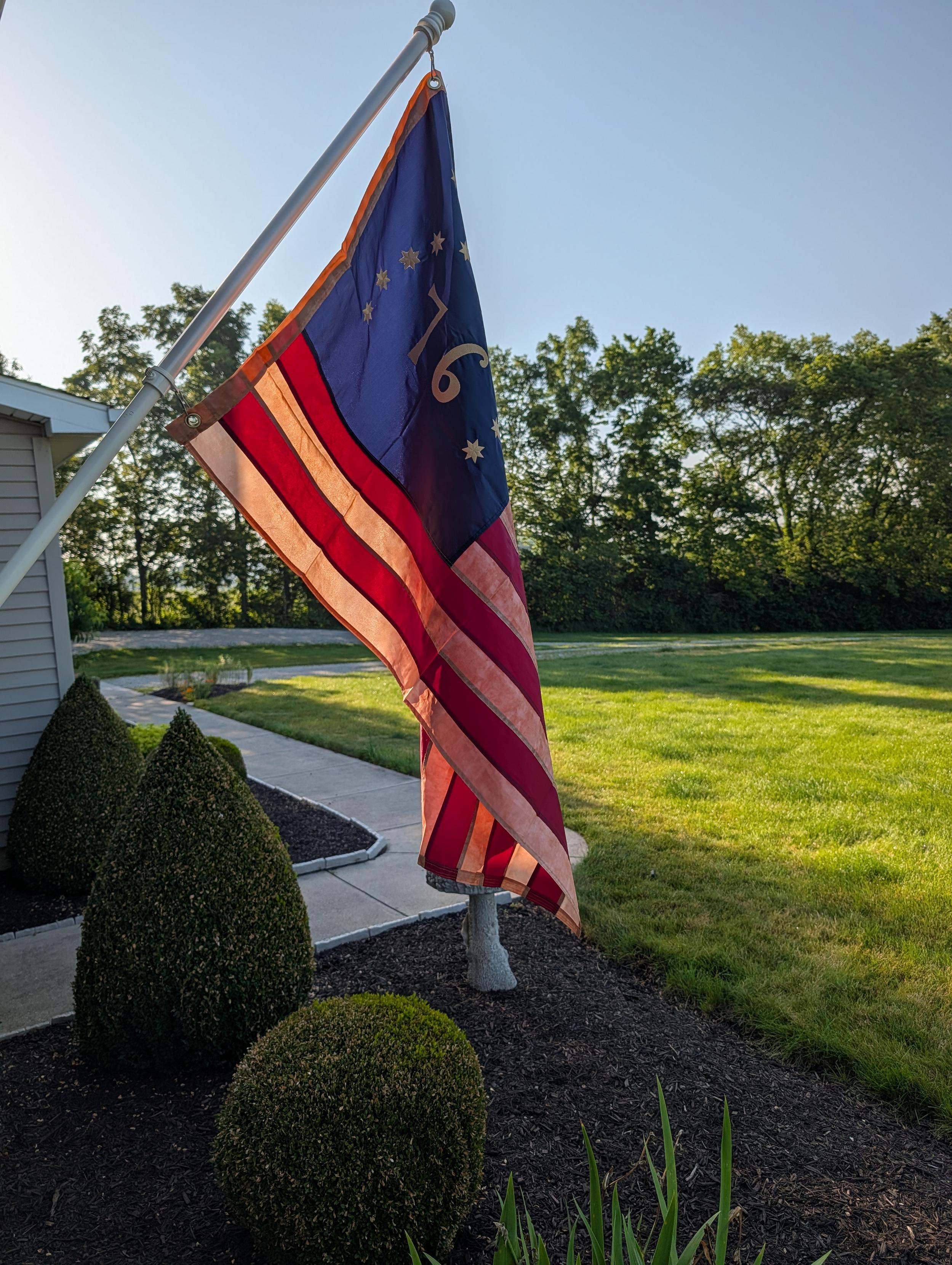 The Bennington Flag, a flag commemorating a great Revolutionary War battle, flying at my house for the occasion of the week of July 4.