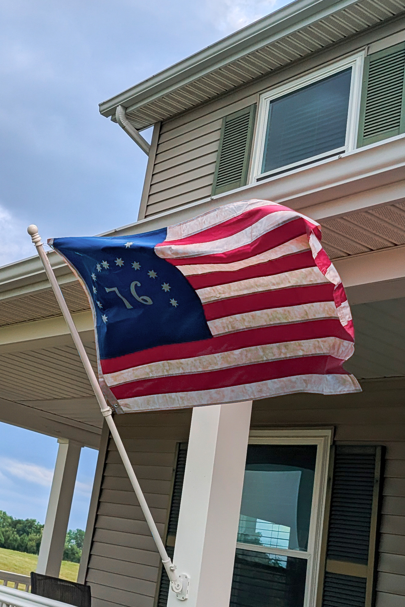 The Bennington Flag (a revolutionary-era variant of the US flag) flying at my house this July 4