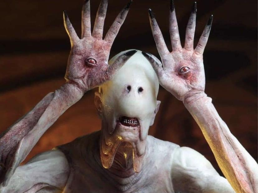 the monster from Pan's ￼￼Labyrinth that has eyes in his palms of his hands, holding them up to the sides of his eyeless face, which weirdly resembles Mitch McConnell.