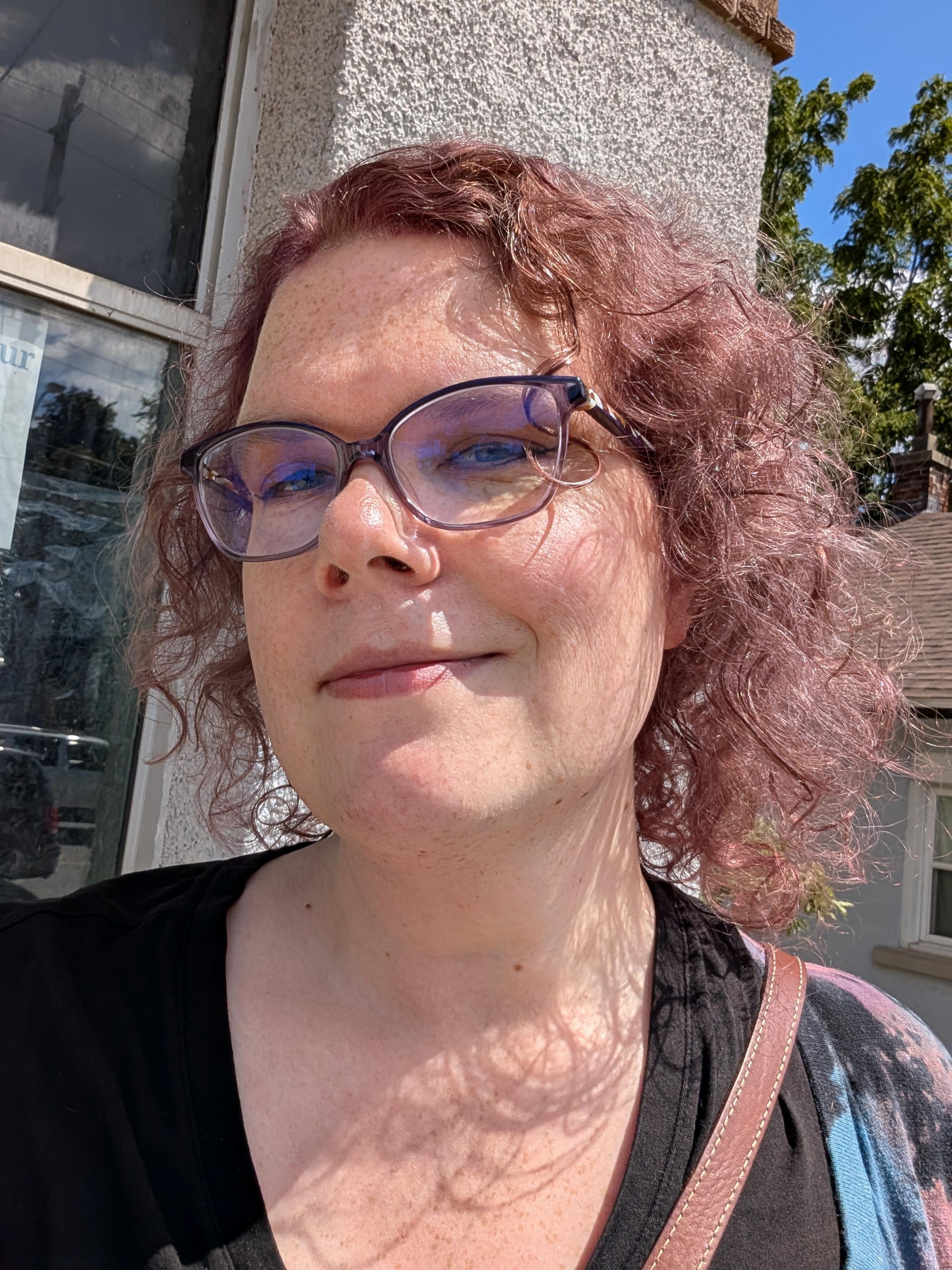 Selfie of white woman with purple hair