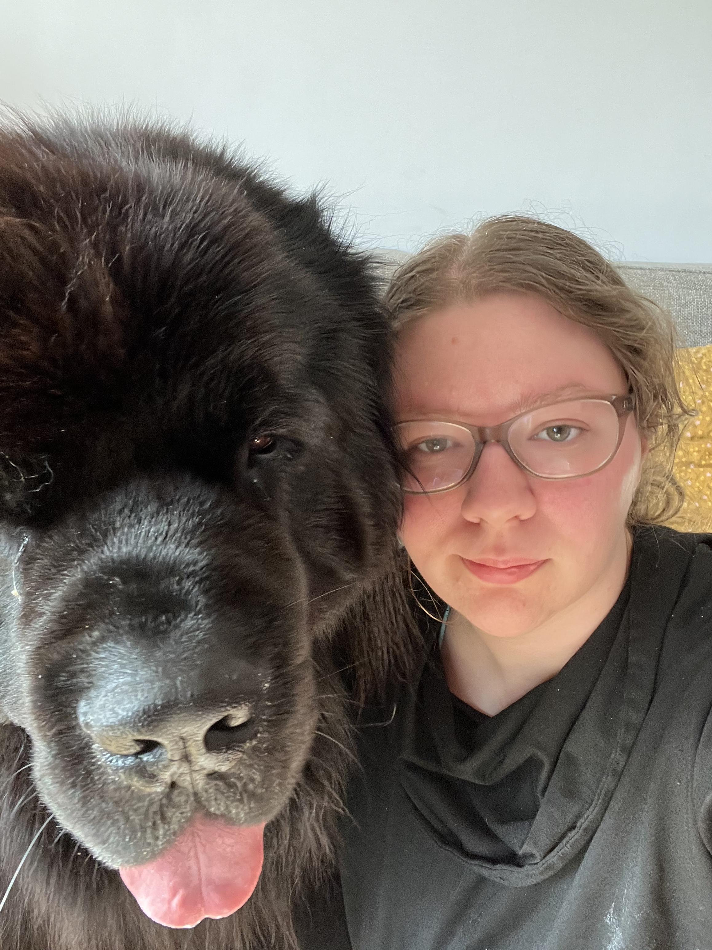 a more recent photo of me with my baby dog; his head is twice as big as mine now