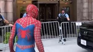 spider-man confronts a cop