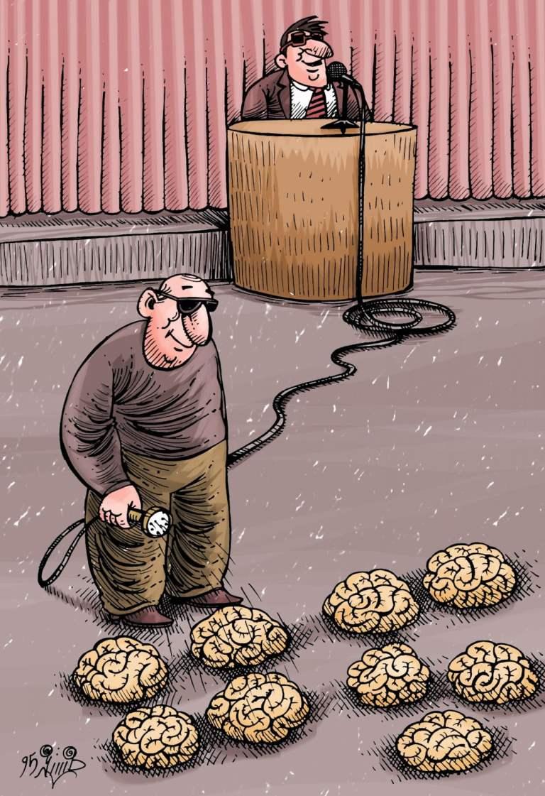 man washing brains in an auditorium