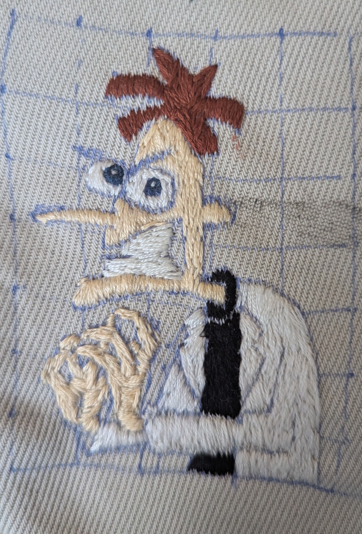 An embroidery of Heinz Doofenshmirtz, with the eyes complete. He looks a little more hinged, in contrast of the kinds of evil schemes he may be cooking up today