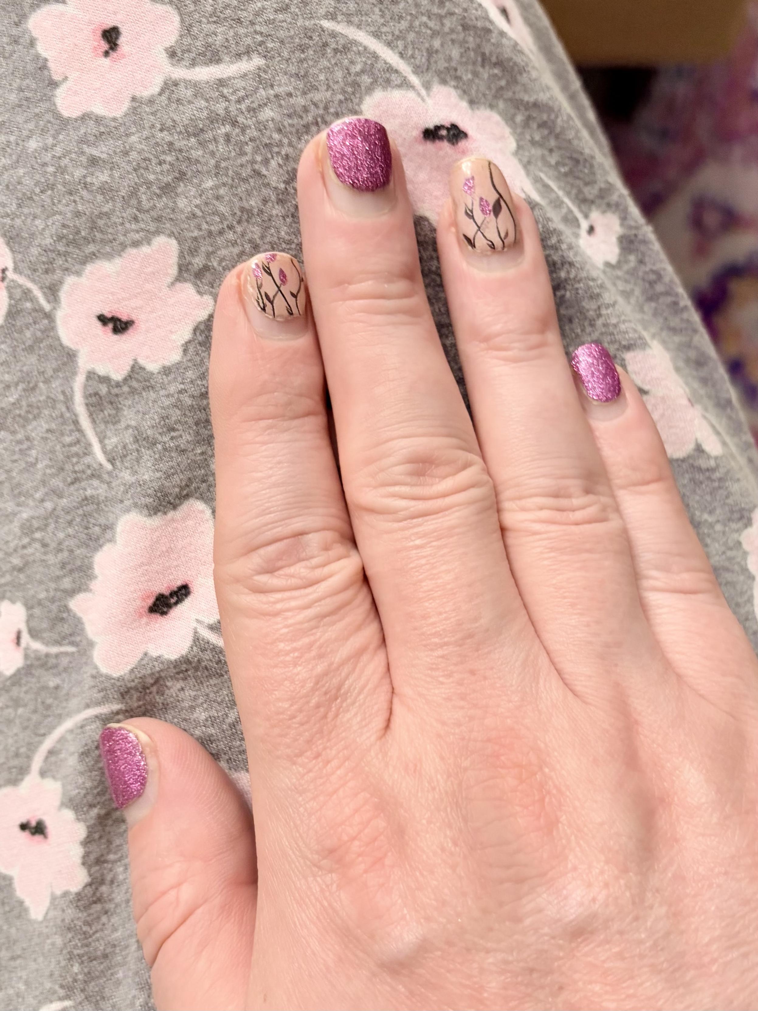 The same set of nails on 8/29/26, still in good shape but grown out several mm.