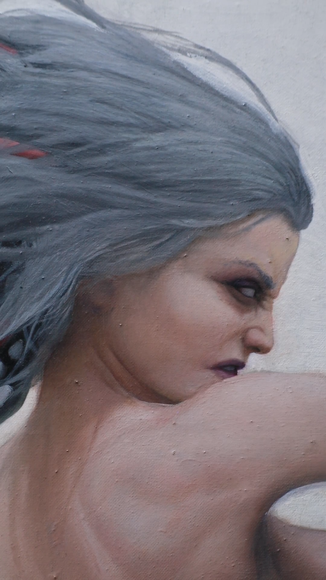 Oil Painting of a angry goddess from side view.