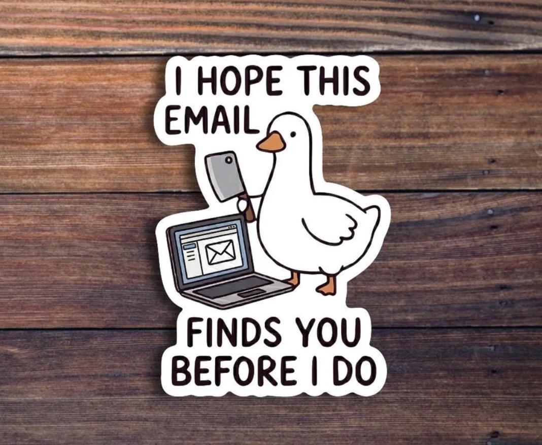 A sticker of a duck holding a knife in front of a laptop with the phrase: I hope this email finds you before I do.