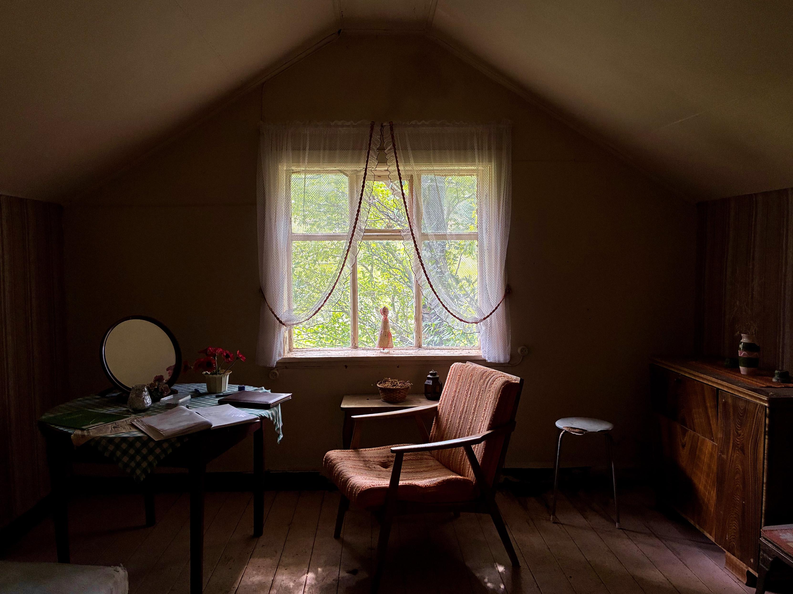 A cosy room in an abandoned house.