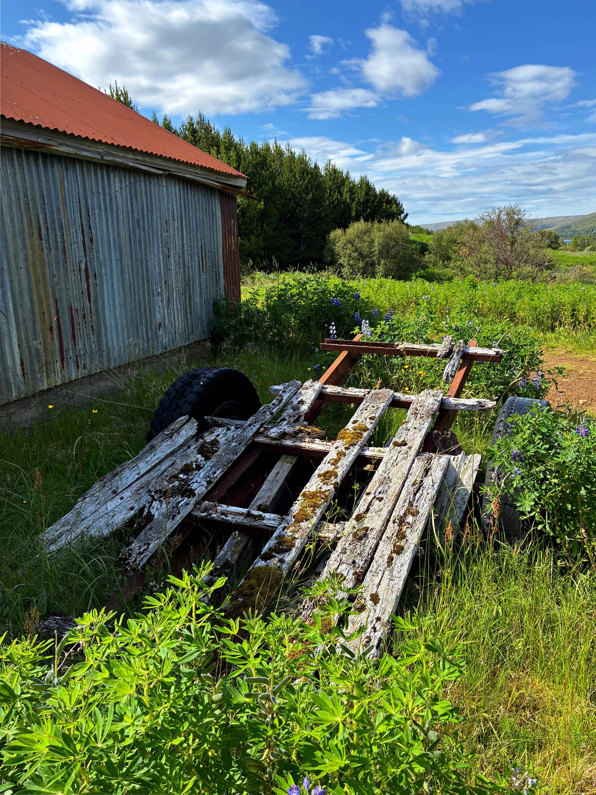 A very old abandoned trailer.