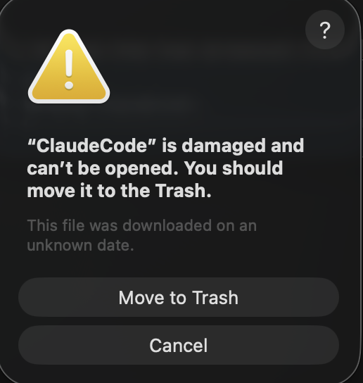 MacOS dialog box with a big yellow warning icon, saying "ClaudeCode" is damaged and can't be opened. You should move it to the Trash.