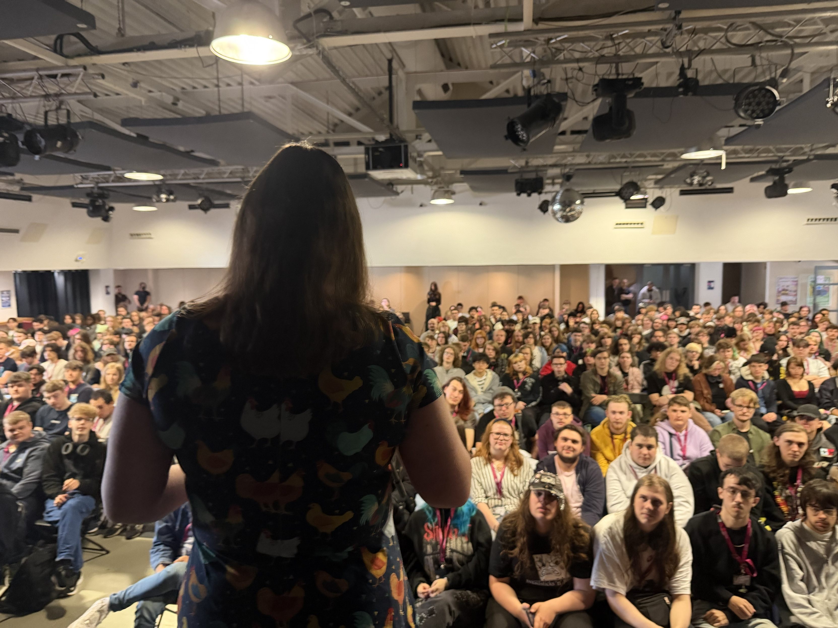 a photo taken from behind me, speaking to a room full of students