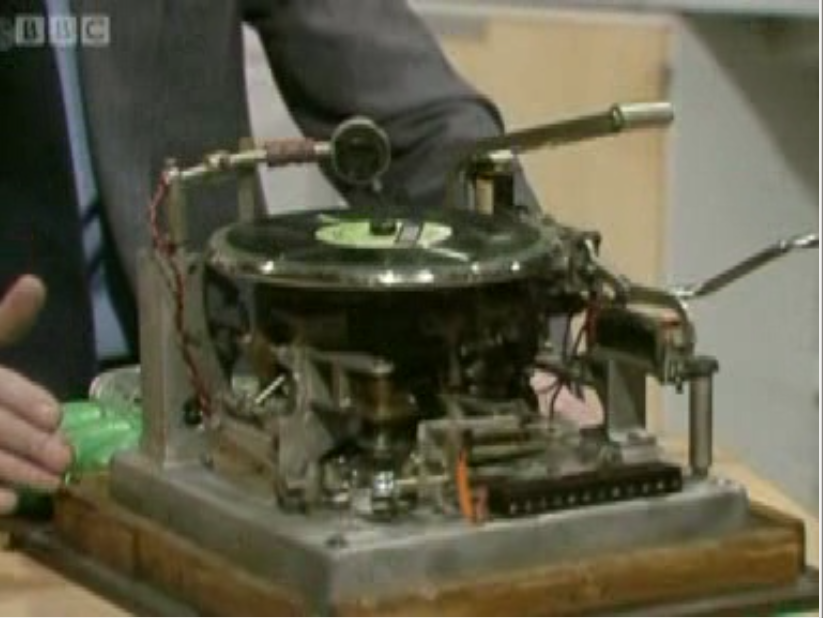 it's loosely a record player on top of some extremely elaborate arm contraption for pulse dialling. kind of amazing brute force stuff if you ask me.