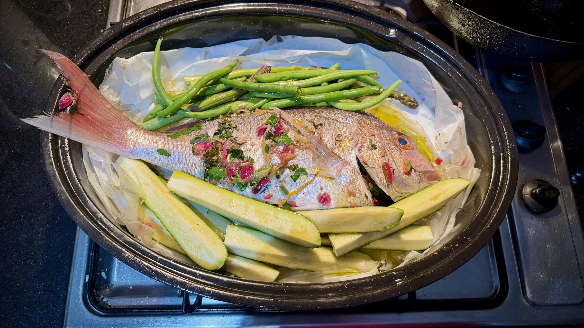 Same fish, same pan, but to the pan have been added some asparagus, green beans, and zucchini sliced longitudinally.