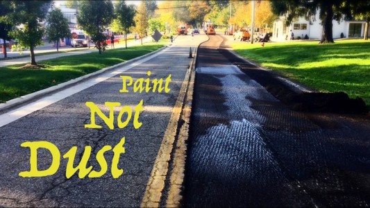 half of a road torn up to be replaced.