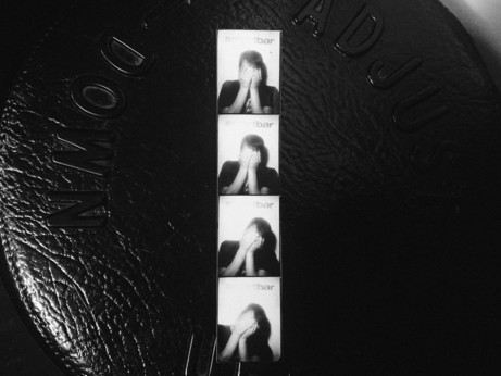 a set of photo booth pictures of me 