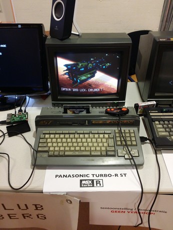 Panasonic MSX turboR FS-A1 ST homecomputer with flashcart and Panasonic controller, photographed at an MSX fair/meeting.