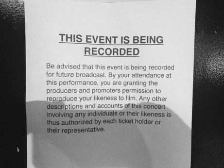 a sign telling club goers they’re going to be filmed