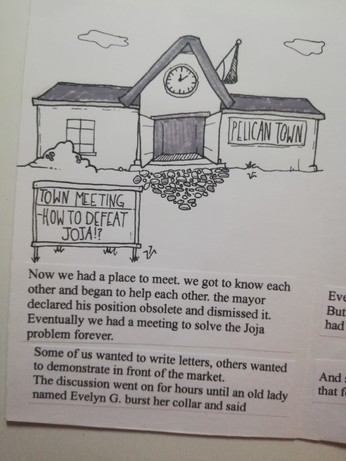 The new community center with a blackboard in front. You can read "Town meeting, how to defeat joja?" 