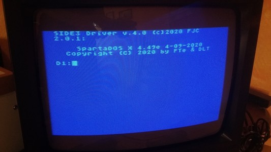 SpartaDOS X 4.49e boot screen from the SIDE3 cartridge. The prompt says

D1:

with the cursor waiting there