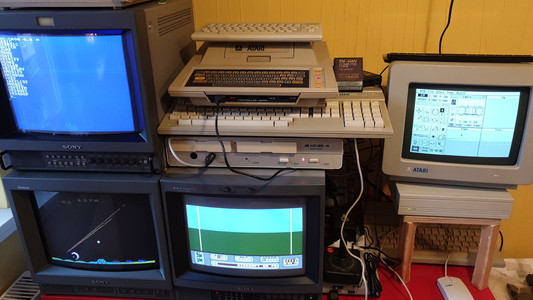 Similar setup, just connected differently, Atari 400, Atari 800XE, Atari ST, KC85/4 and monitors, 3 Trinitron and SM124.