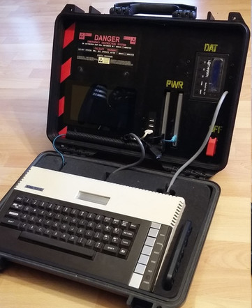 An Atari 800XL in a hard-top case, usable as mobile computer.