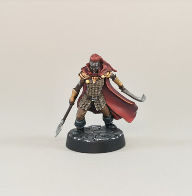 Image of Ren-Ren Pakk, a crimson haired assassin armed with a short spear and curved sword, with tattoos on her face and arms